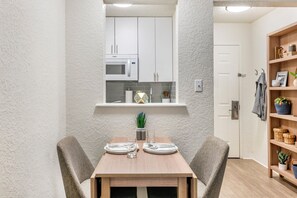 Fridge, microwave, stovetop, dining tables - InTown Suites Extended Stay Nashville TN Madison (Madison)