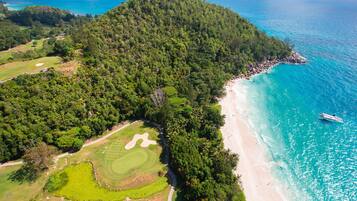 Enjoy golfing on the well-maintained fairway and explore the surrounding forest.