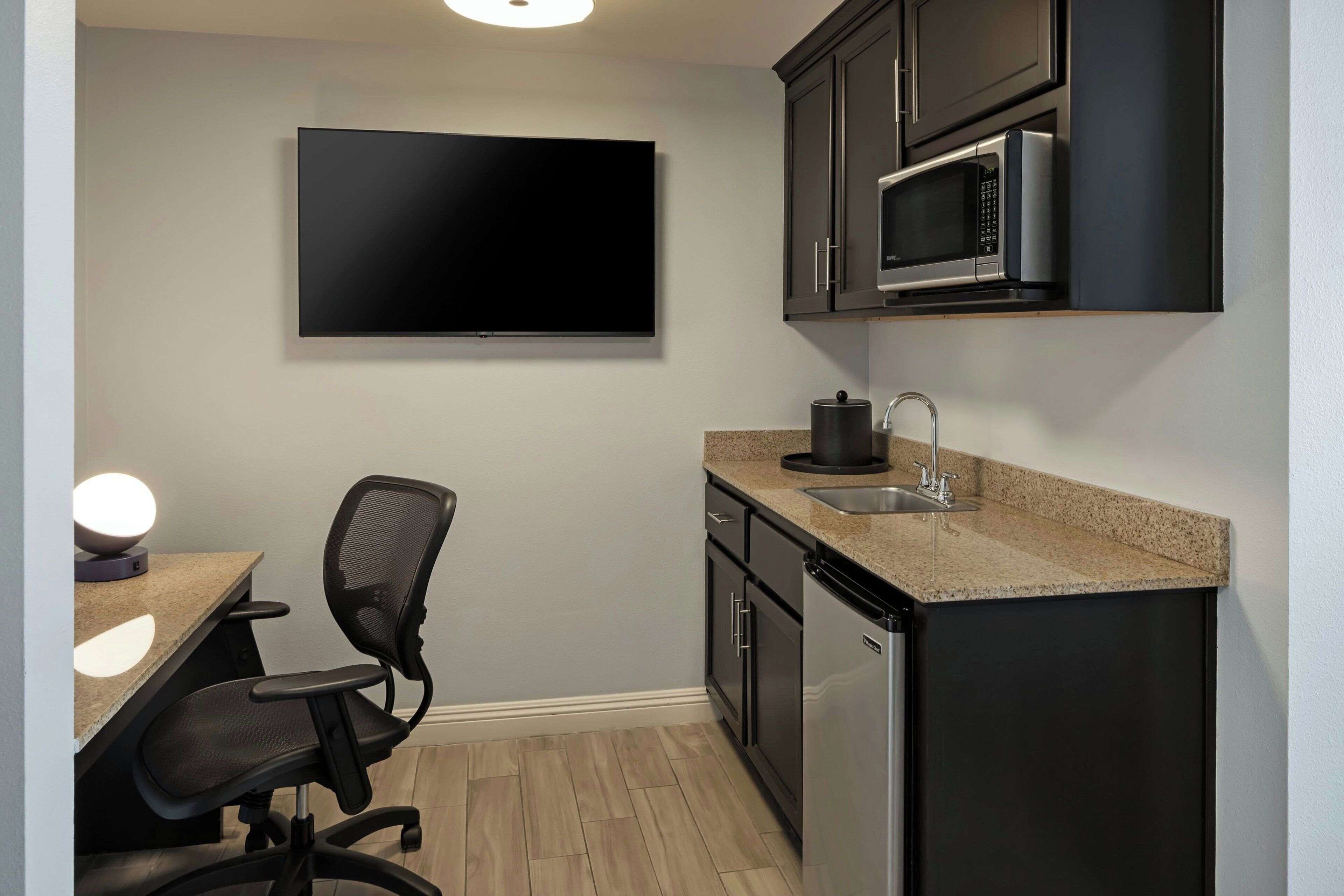 Studio, 1 Queen Bed with Sofa bed, Courtyard View | Private kitchen | Coffee/tea maker, fridge, microwave