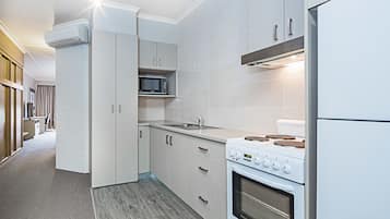 Deluxe One Bedroom Apartment | Private kitchen