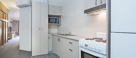 Deluxe One Bedroom Apartment | Private kitchen