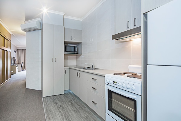 Deluxe One Bedroom Apartment | Private kitchen