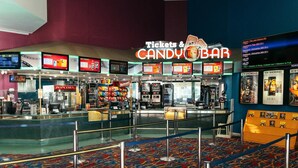 A cinema lobby with a candy bar, popcorn machines, and a ticket counter. - Pavilion Hotel Wagga Wagga (Wagga Wagga)