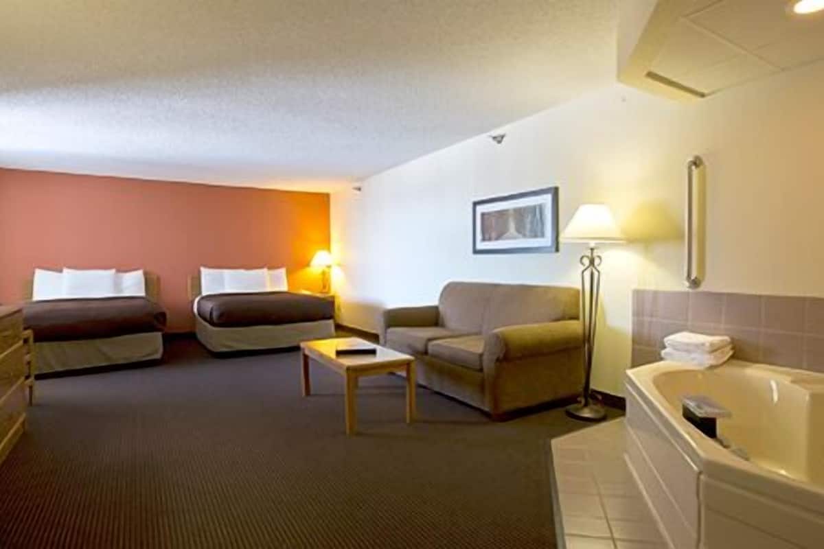 deluxe suite, 2 queen beds, non smoking | desk, iron/ironing board, free wifi, bed sheets