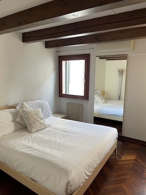 Standard Apartment | Down comforters, in-room safe, desk, laptop workspace