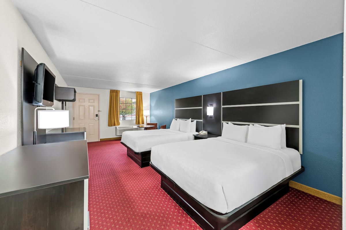 Room, 2 Queen Beds, Non Smoking | Pillowtop beds, desk, laptop workspace, iron/ironing board