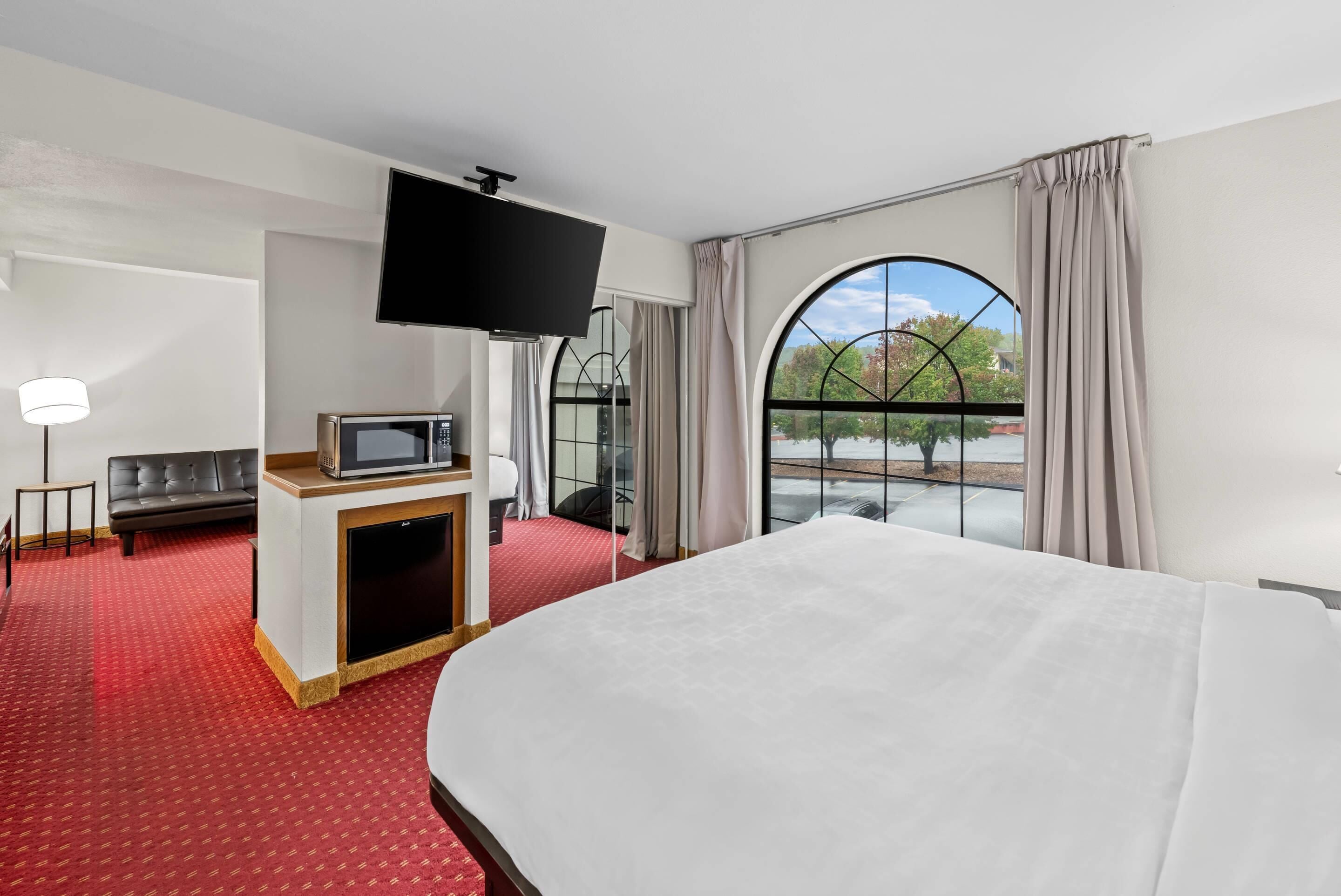 Suíte, 1 cama King, para não fumantes (Upgrade) | Camas com colchões pillow-top, escrivaninha