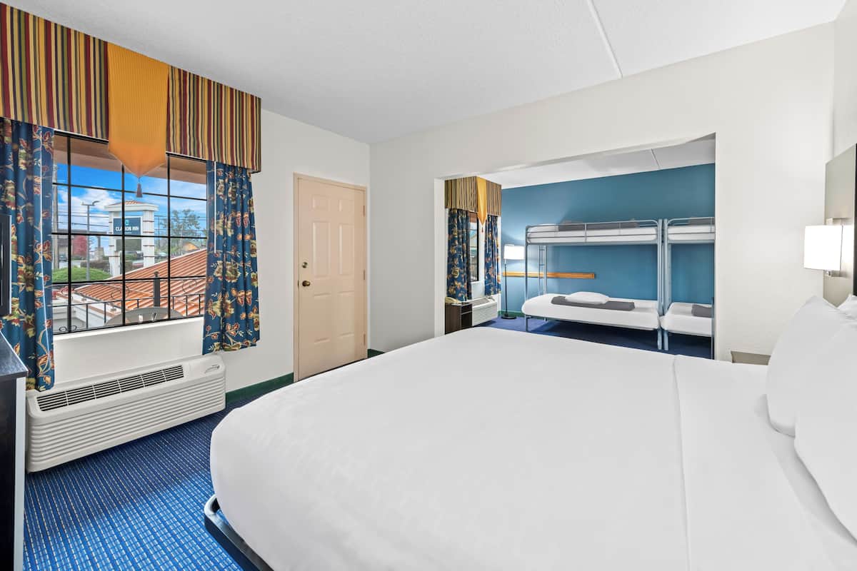 Suite, Multiple Beds, Non Smoking | Pillowtop beds, desk, laptop workspace, iron/ironing board