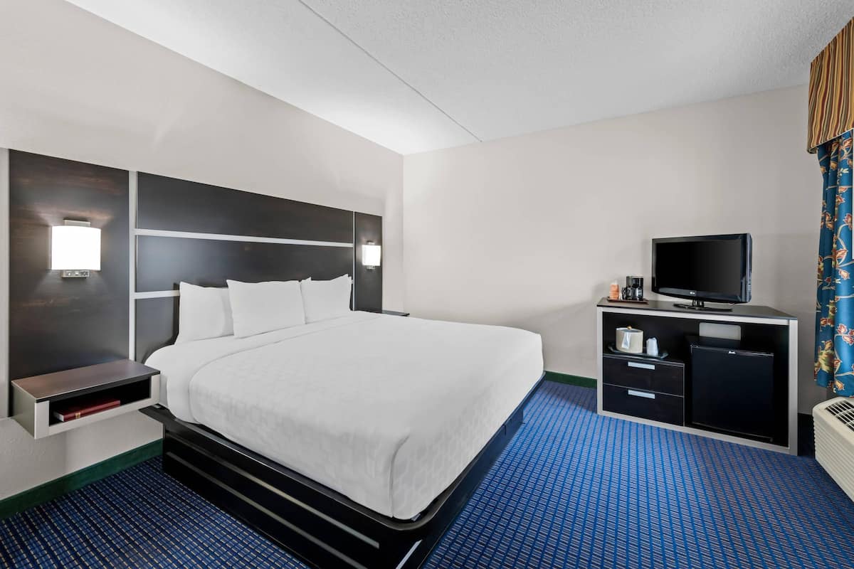 Suite, Multiple Beds, Non Smoking | Pillowtop beds, desk, laptop workspace, iron/ironing board