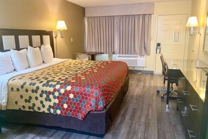 Desk, laptop workspace, blackout curtains, free WiFi