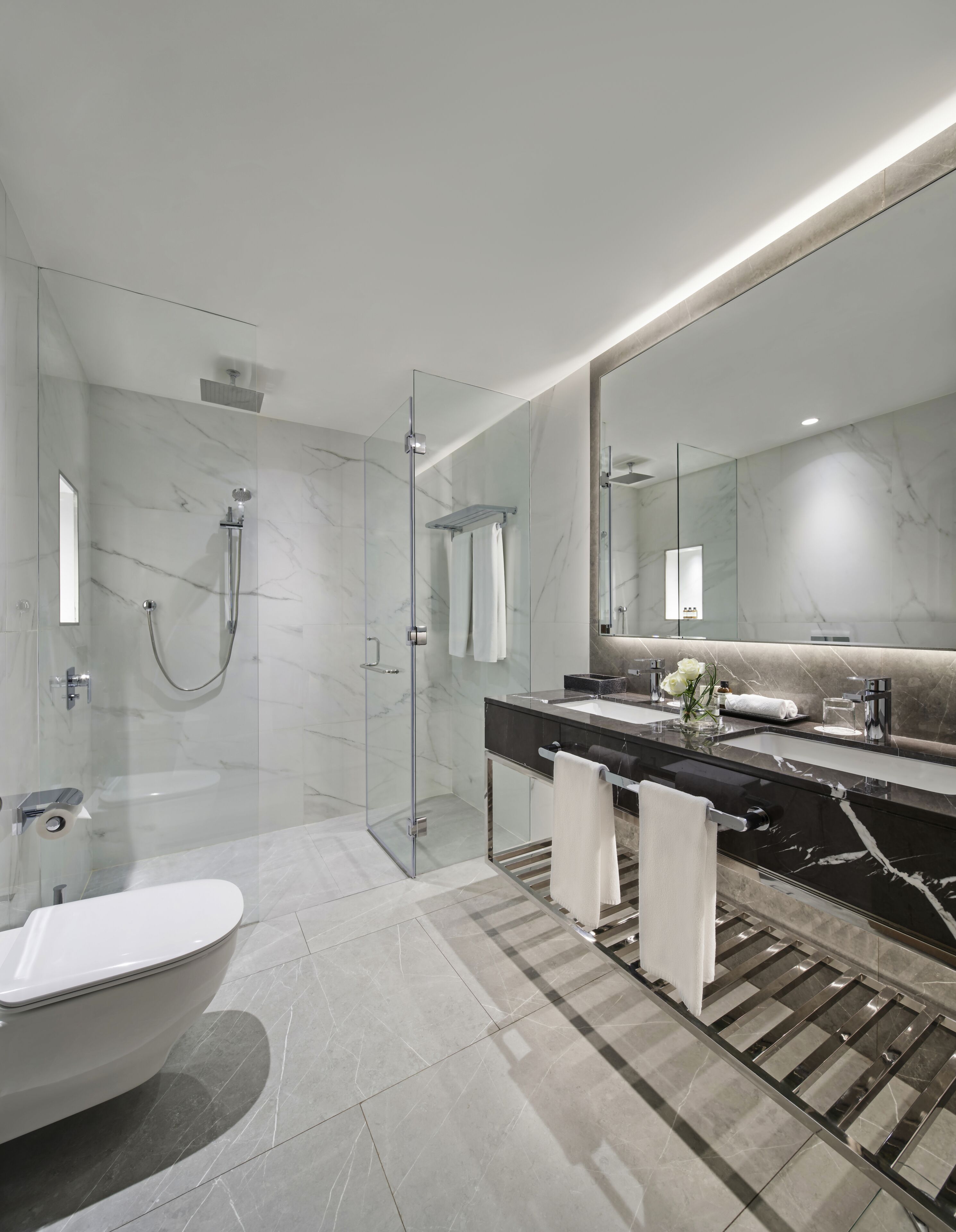 separate bathtub and shower, deep-soaking bathtub, designer toiletries