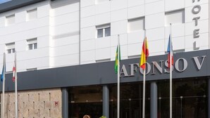 A hotel facade with the name "AFONSO V" prominently displayed. - Hotel Afonso V (Aveiro)