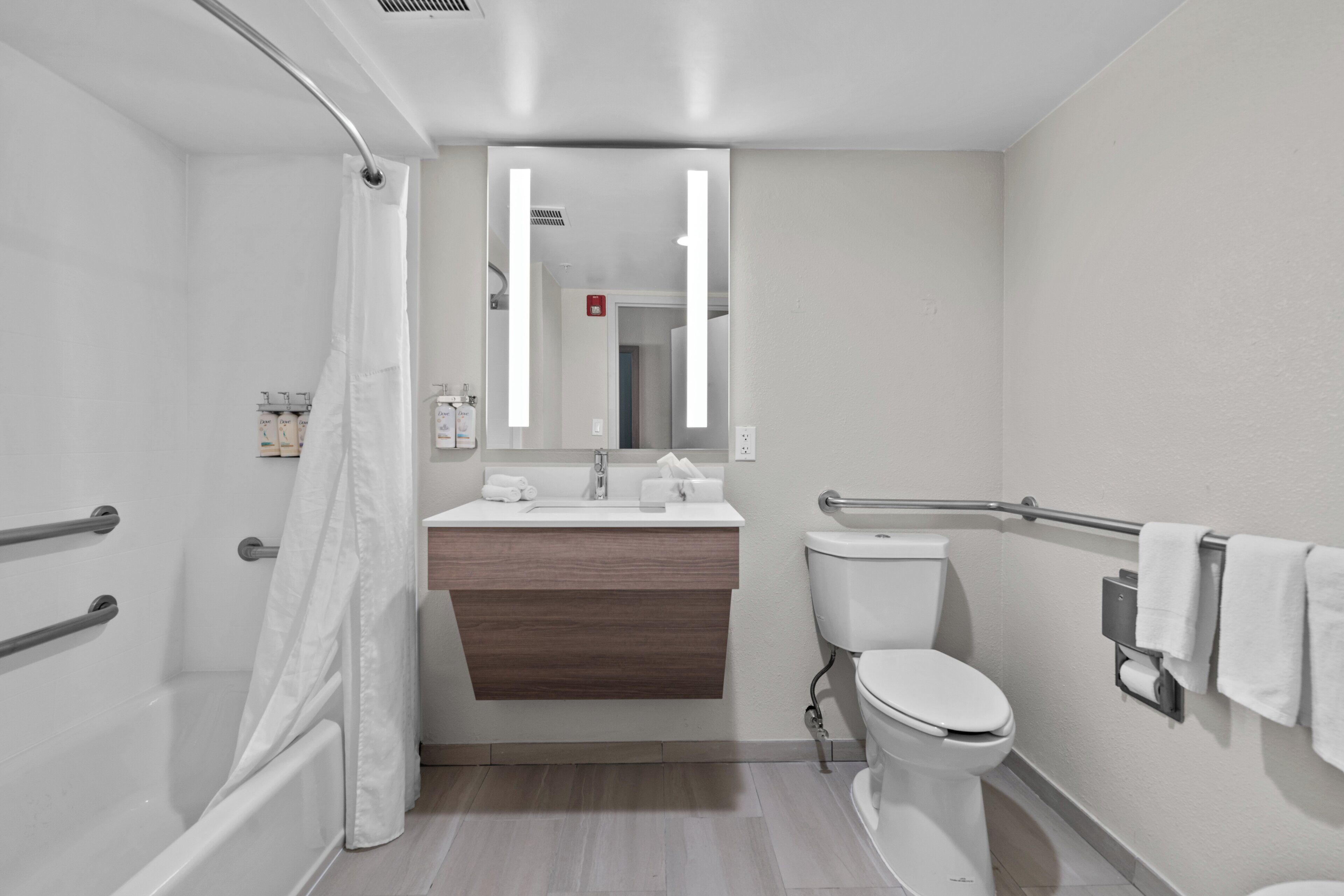 hair dryer, towels, soap, shampoo