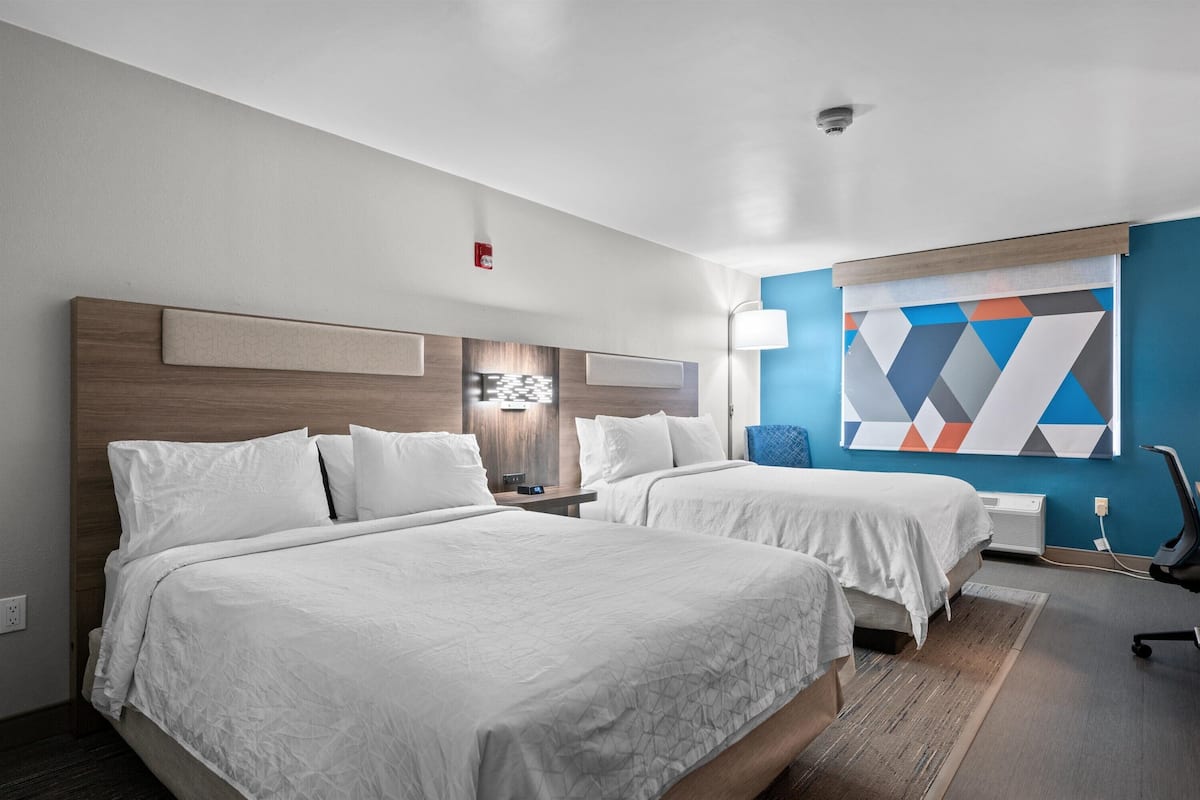 standard room, 2 queen beds | desk, iron/ironing board, free cots/infant beds, rollaway beds