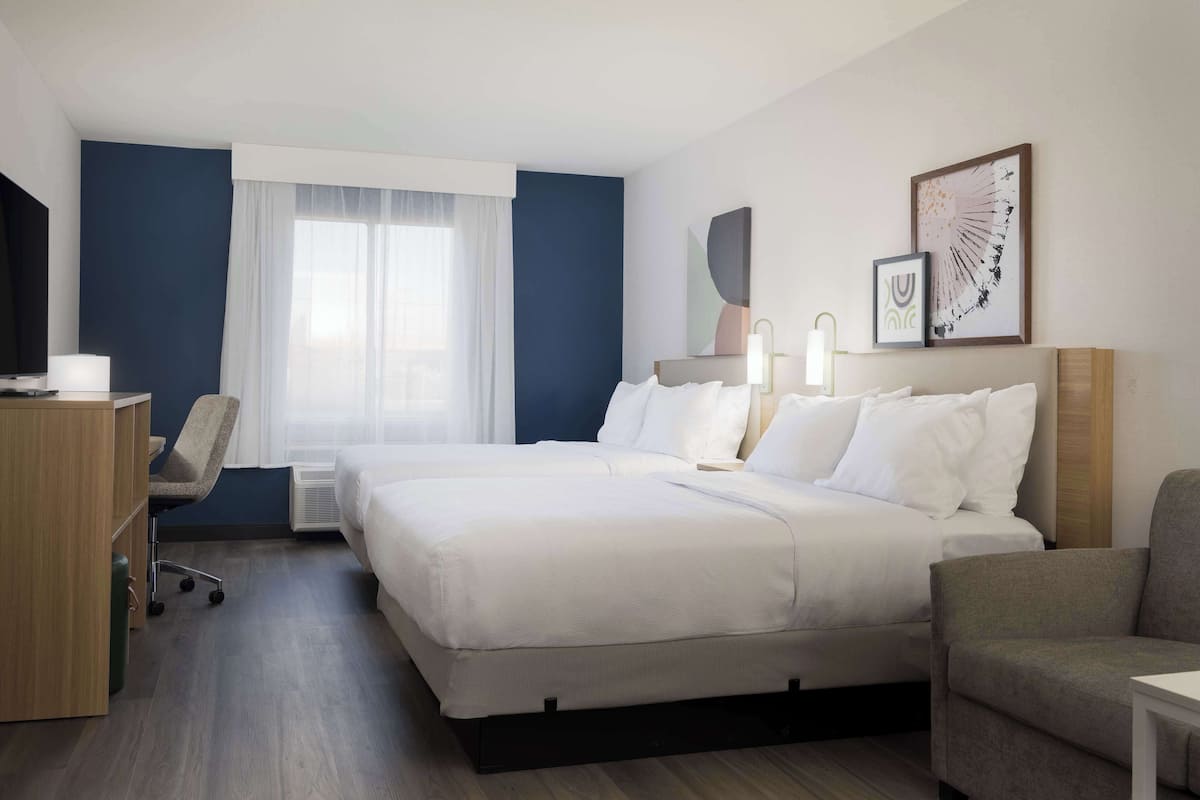Studio, 2 Queen Beds | Desk, laptop workspace, iron/ironing board, free cribs/infant beds