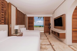 Premium bedding, down comforters, pillowtop beds, free minibar
