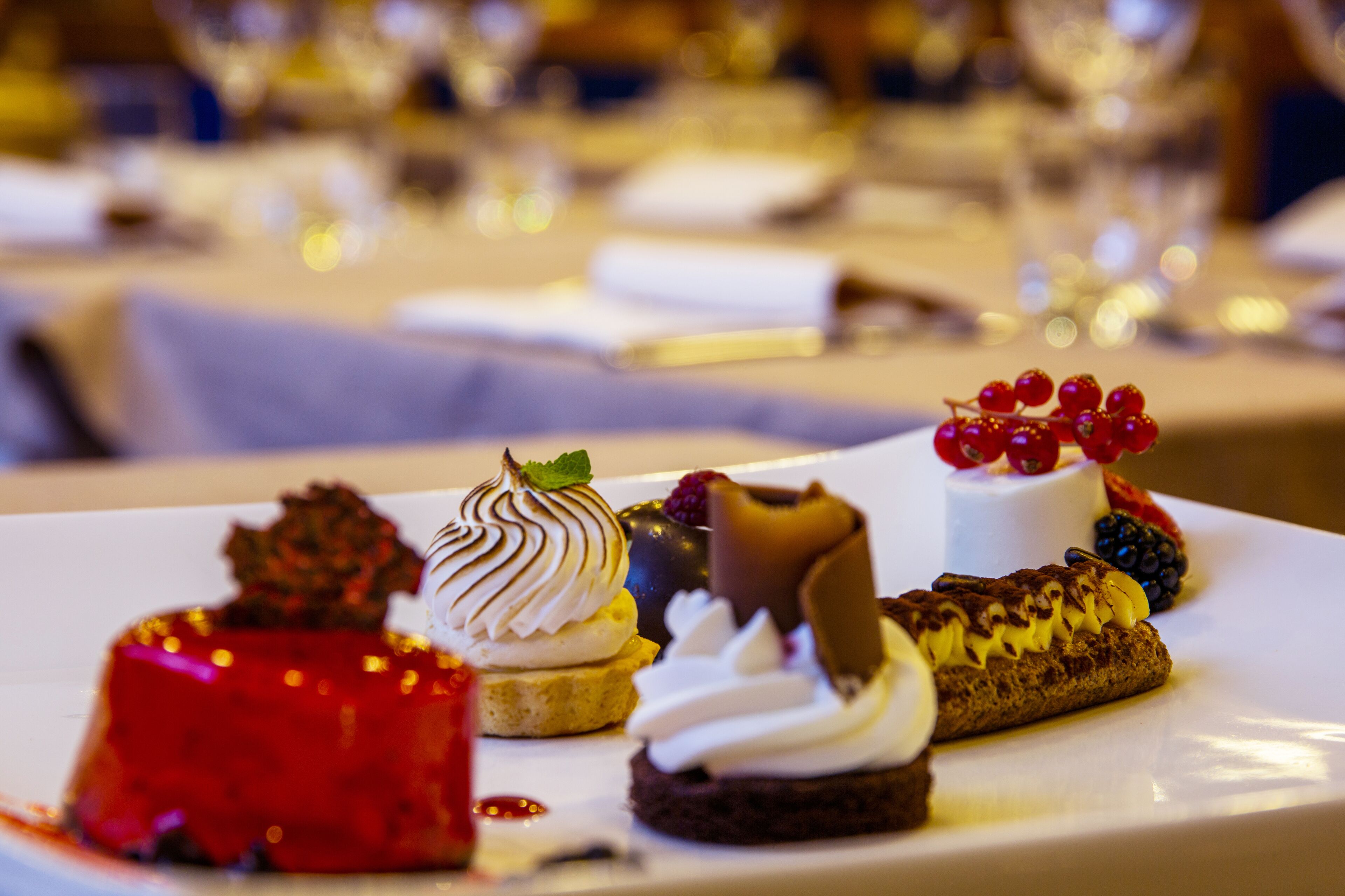 A dessert plate with various pastries and fruits.