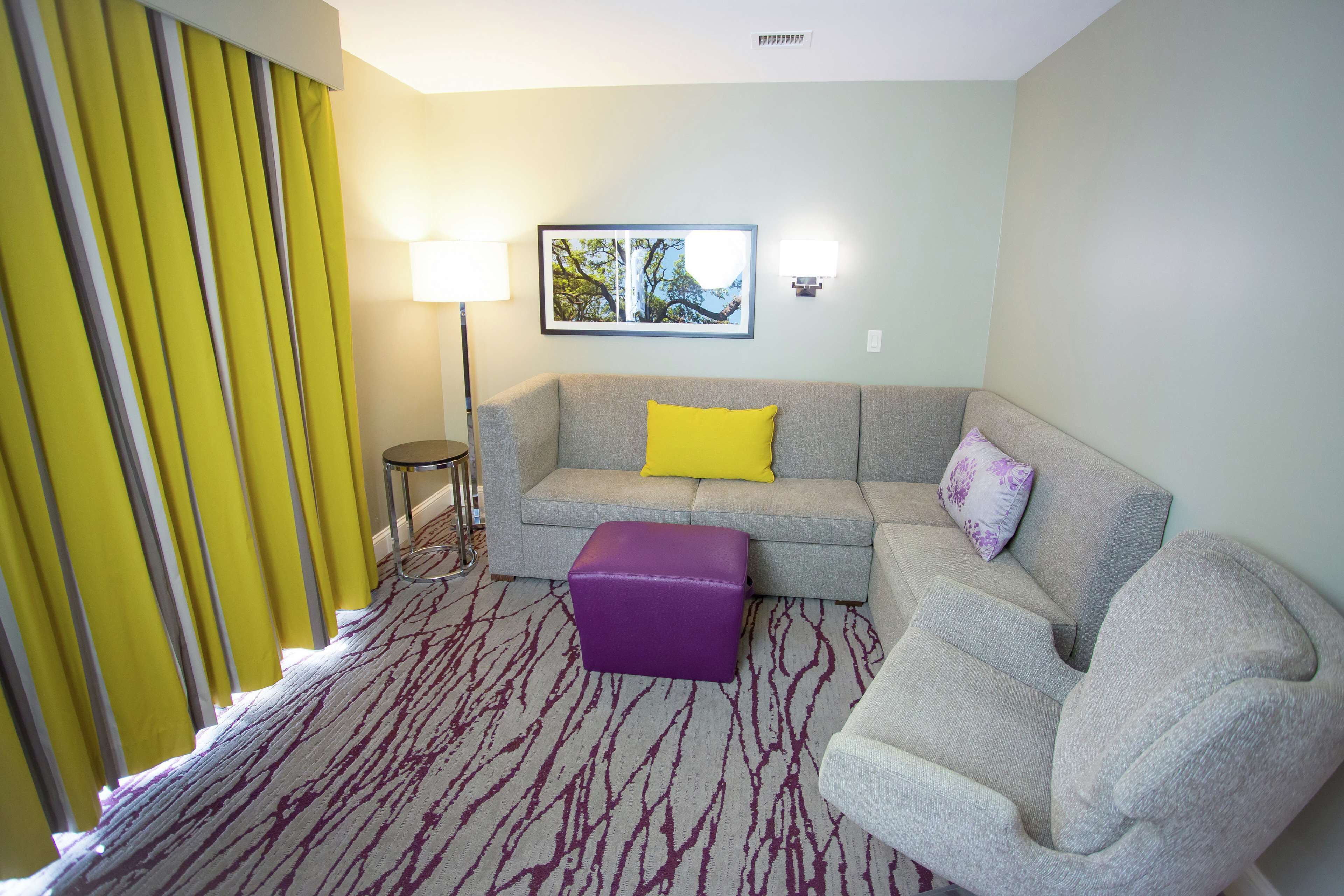 junior suite, 1 king bed, accessible, balcony (mobility, hearing, bathtub) | living area | 37-inch flat-screen tv with cable channels, tv, mp3 dock