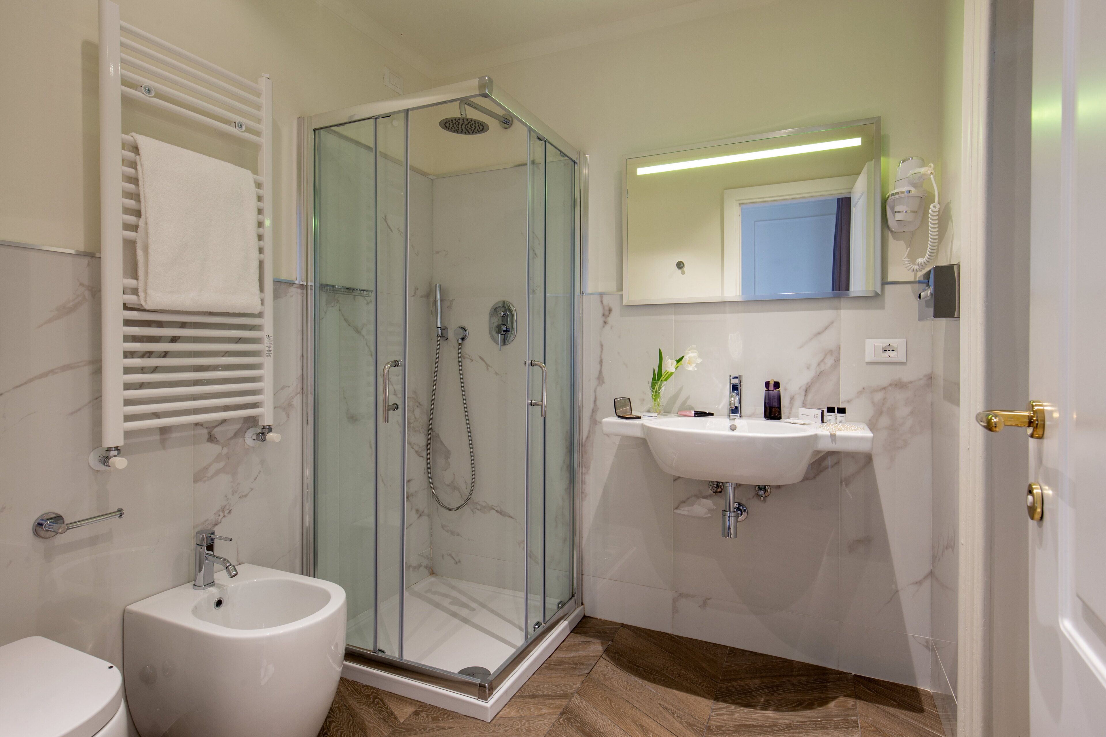 superior room, 1 queen bed | bathroom | shower, hair dryer, bidet, towels