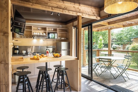 Family Chalet | Living area. Camping de Paris