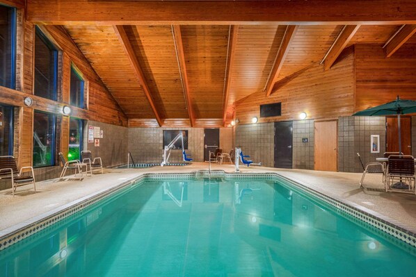 Indoor pool, pool umbrellas, sun loungers