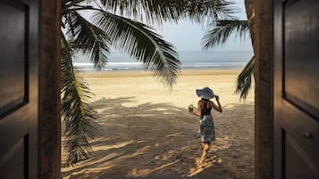 Guests can enjoy stunning views of the beach from the comfort of their room.