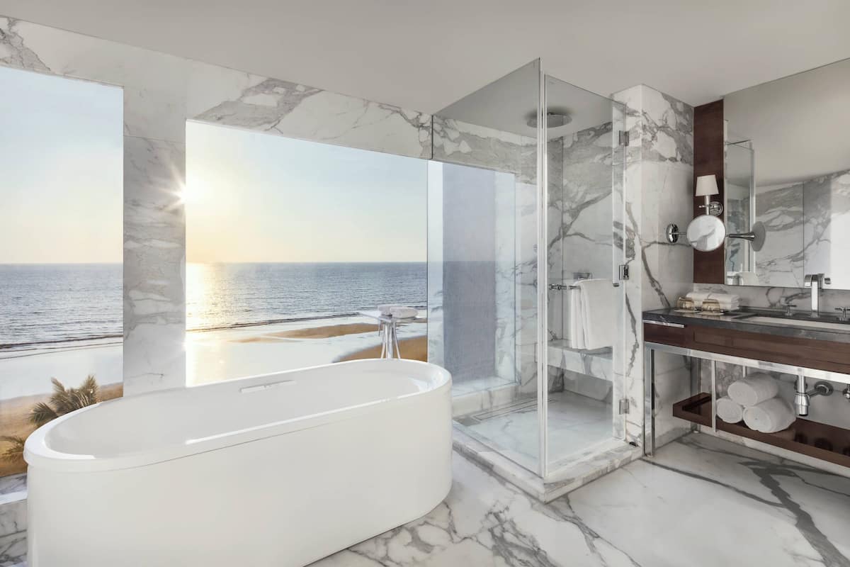 eco-friendly toiletries, hair dryer, bathrobes, slippers