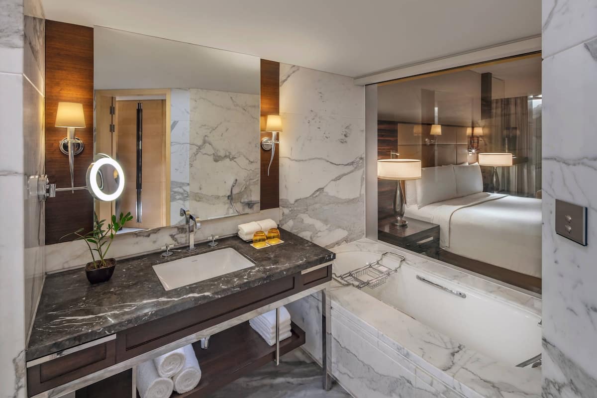 eco-friendly toiletries, hair dryer, bathrobes, slippers