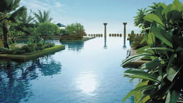 2 outdoor pools, pool umbrellas, pool loungers