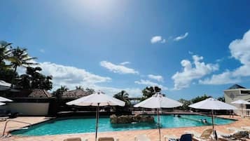 Outdoor pool, pool umbrellas, pool loungers