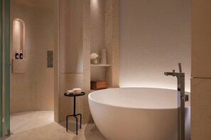 Separate tub and shower, deep soaking tub, designer toiletries