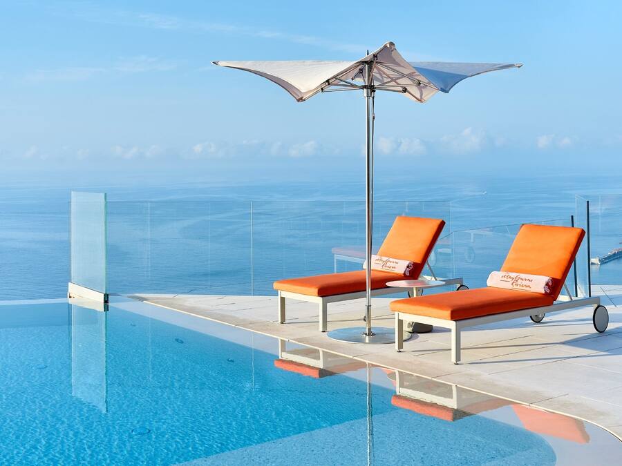 Outdoor pool, open 9:00 AM to 6:00 PM, pool umbrellas, sun loungers