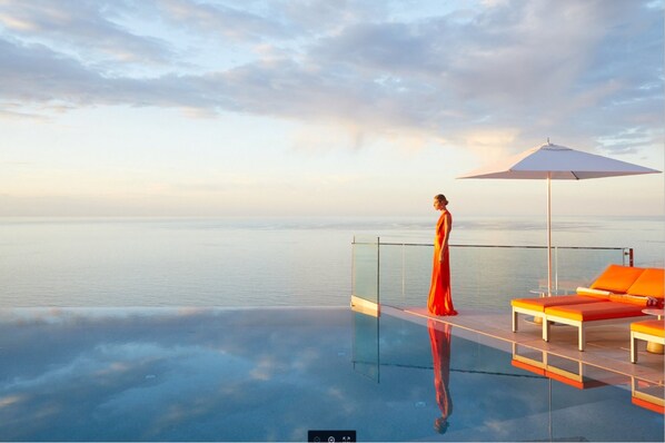 Outdoor pool, open 9:00 AM to 6:00 PM, pool umbrellas, sun loungers