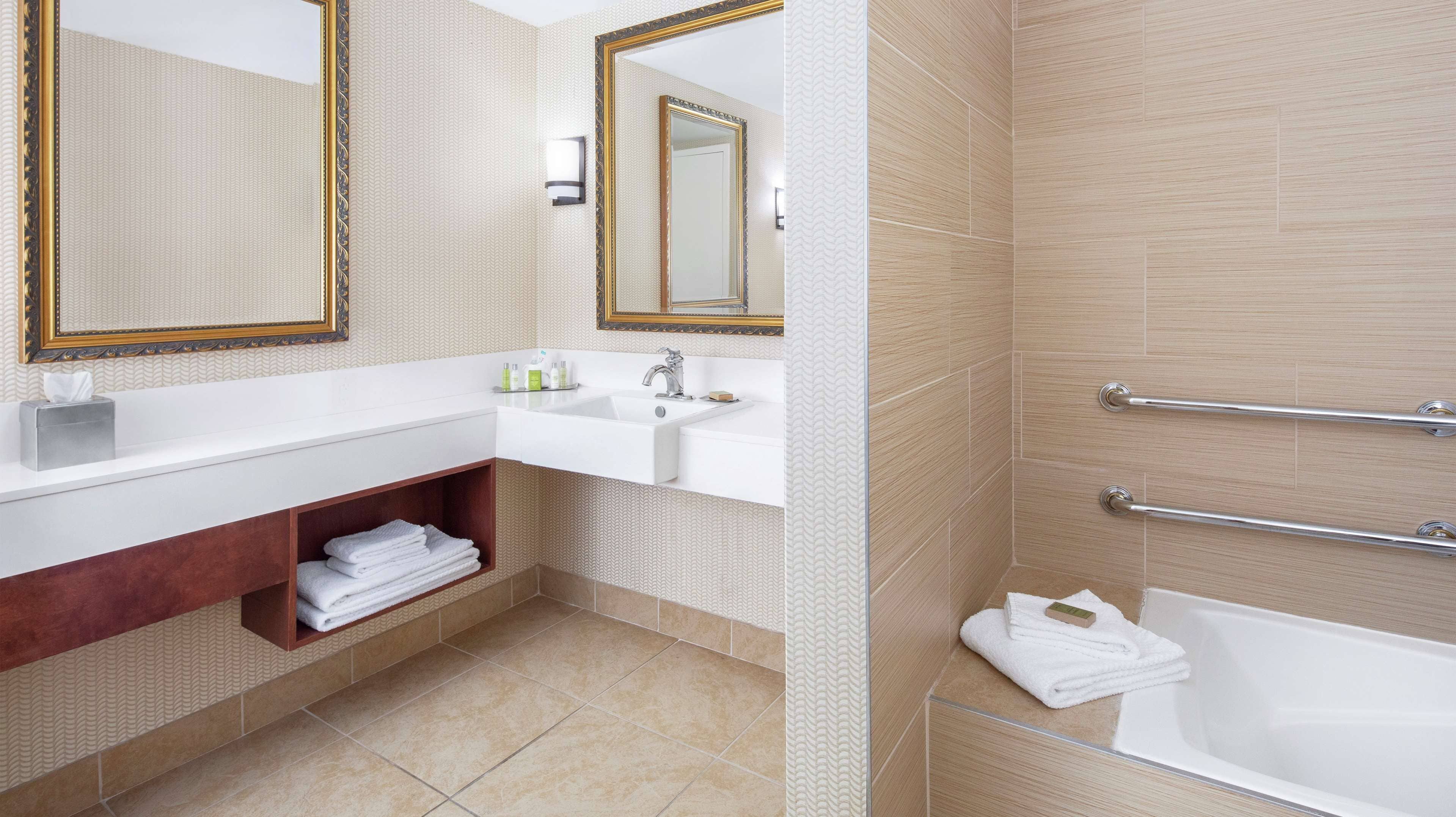 presidential suite, 1 king bed, non smoking | bathroom | free toiletries, hair dryer, towels, soap