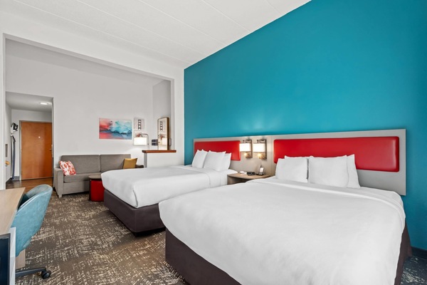 Premium Suite, 2 Queen Beds, Accessible, Non Smoking | In-room safe, desk, laptop workspace, iron/ironing board