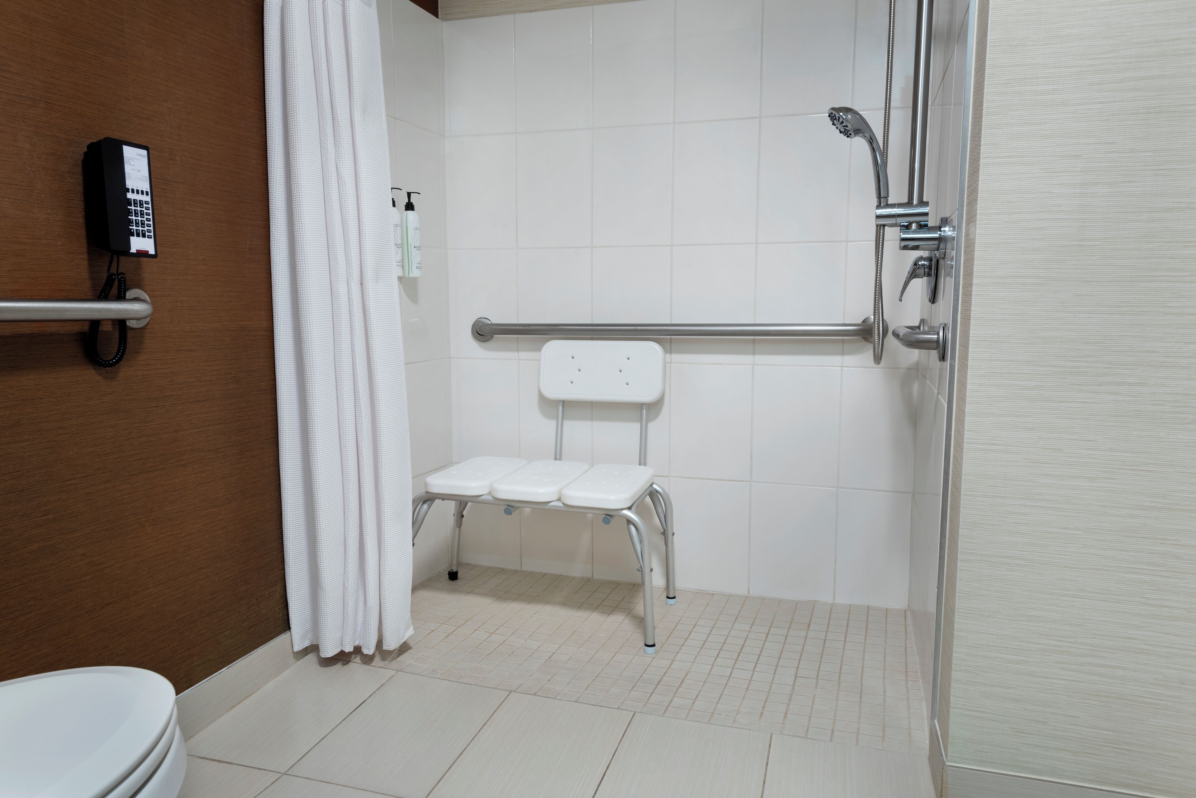 combined shower/bathtub, free toiletries, hair dryer, towels