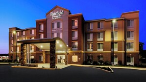 A multi-story Fairfield by Marriott Inn & Suites building with a prominent entrance, a covered outdoor area, and a parking lot. - Fairfield Inn & Suites by Marriott Dover (Dover)