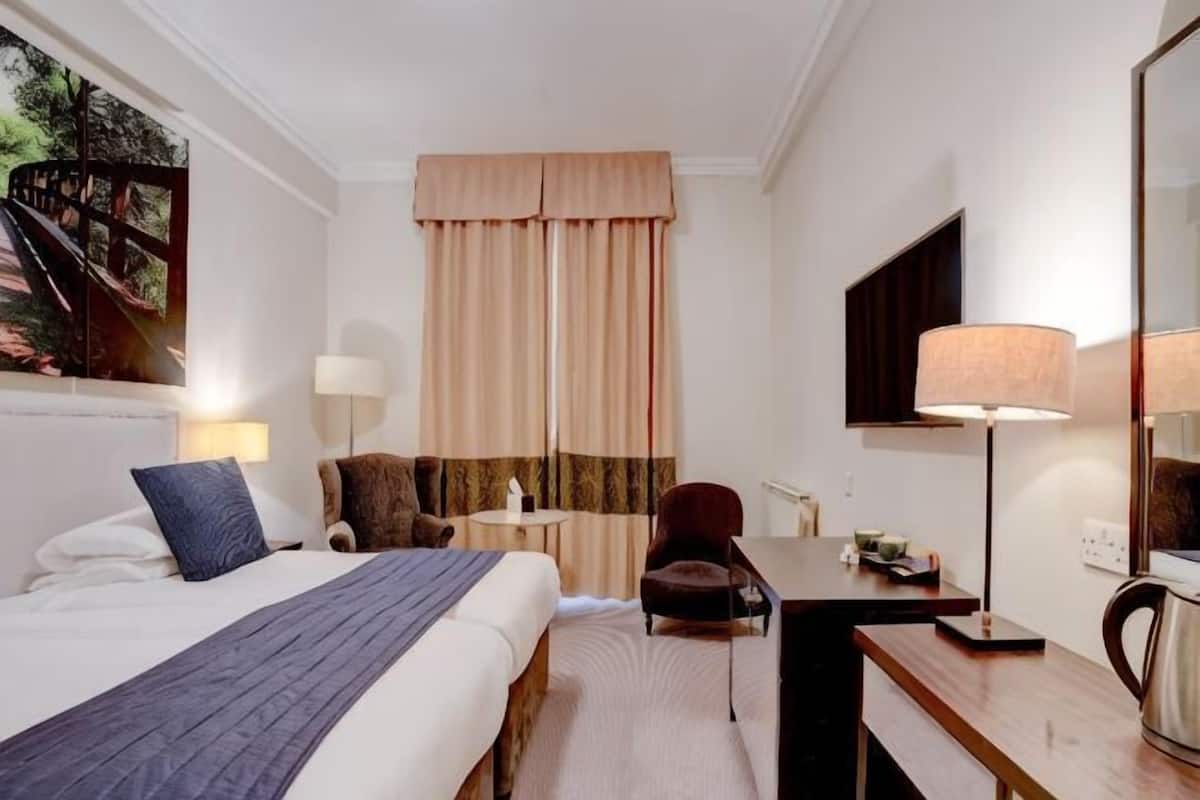 In-room safe, desk, iron/ironing board, cribs (free)