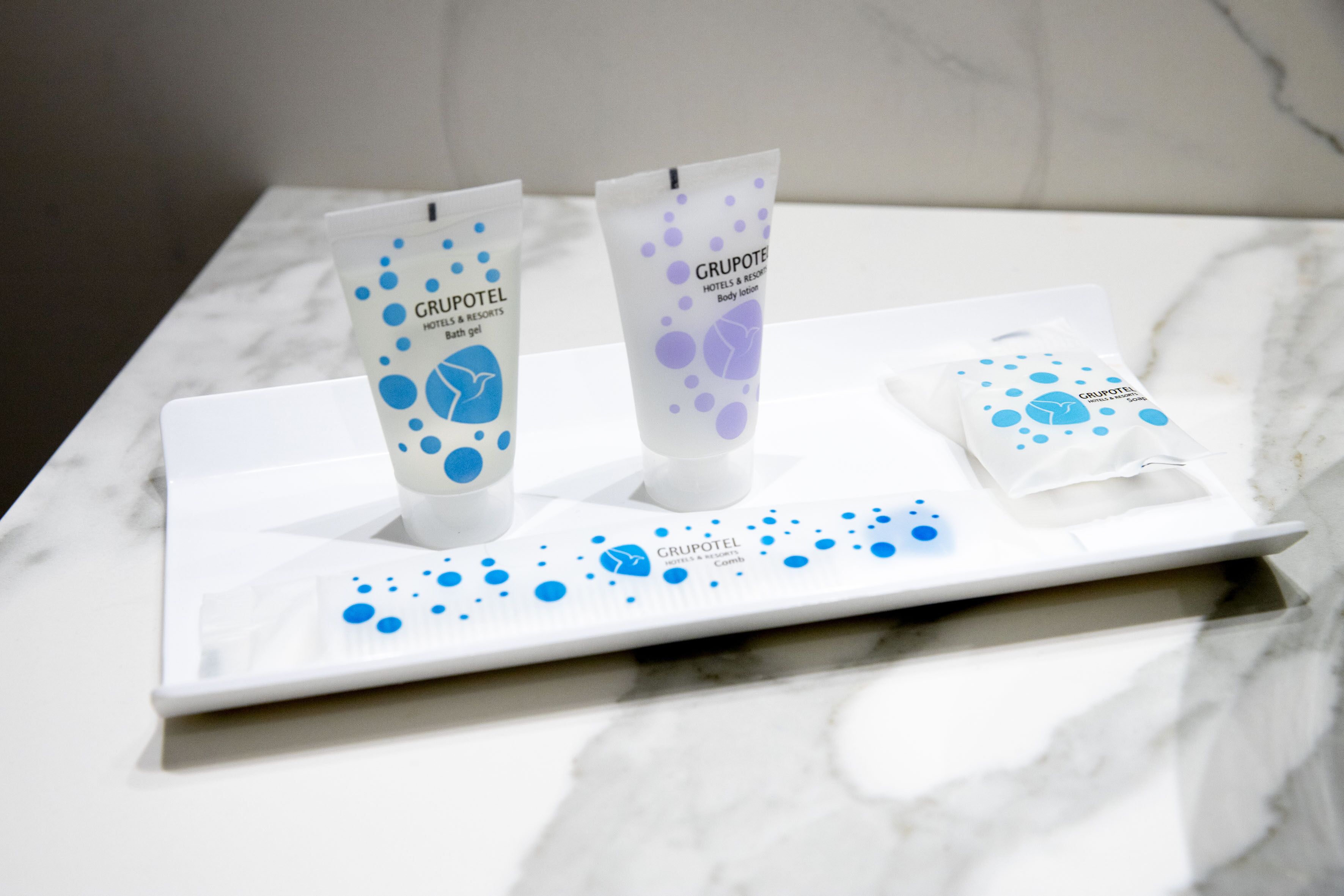 bathtub, hair dryer, bidet, towels