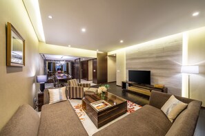 3 Bedroom Premier, 3 Bedrooms | Living area | 32-inch TV with satellite channels