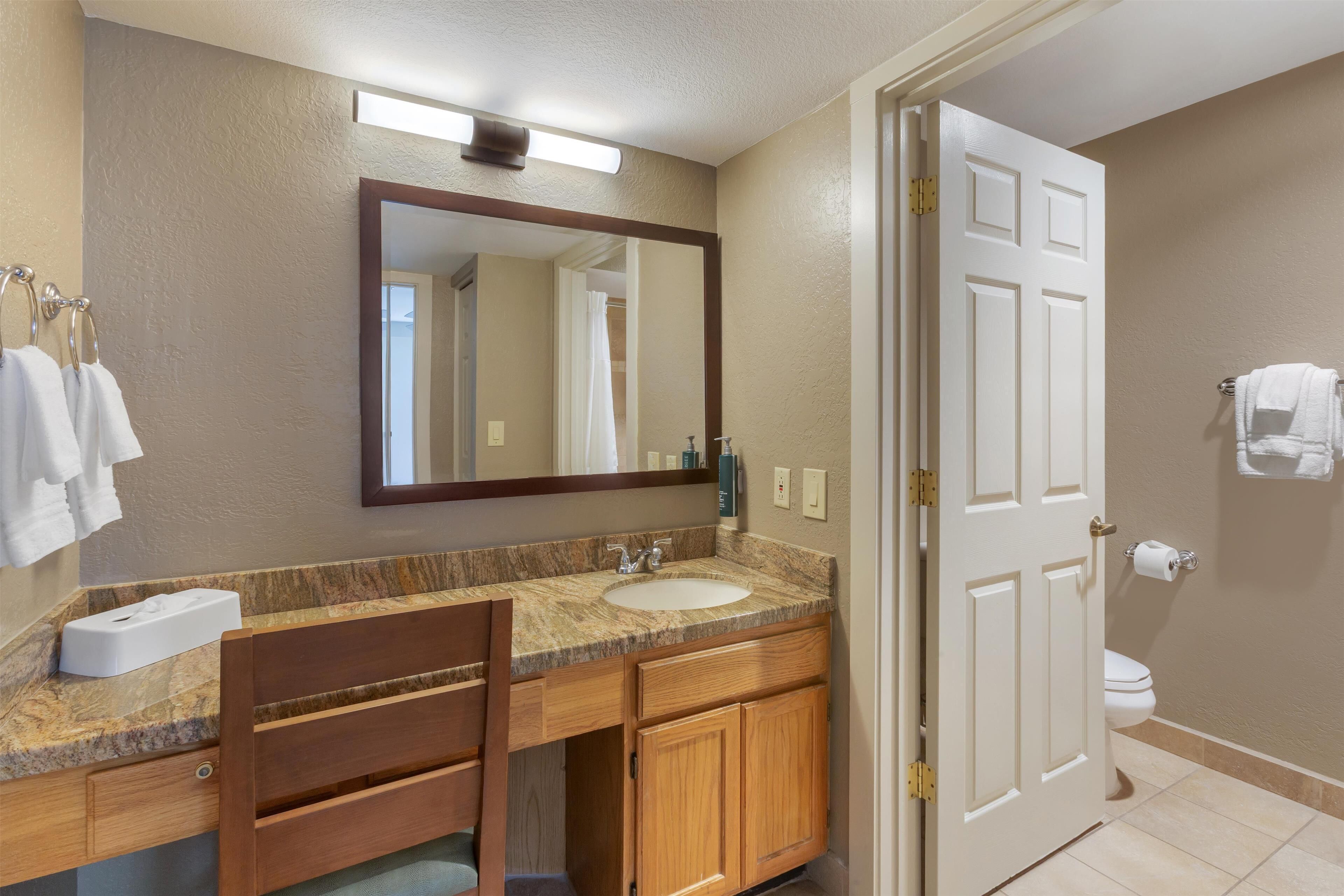 bathtub, free toiletries, hair dryer, towels