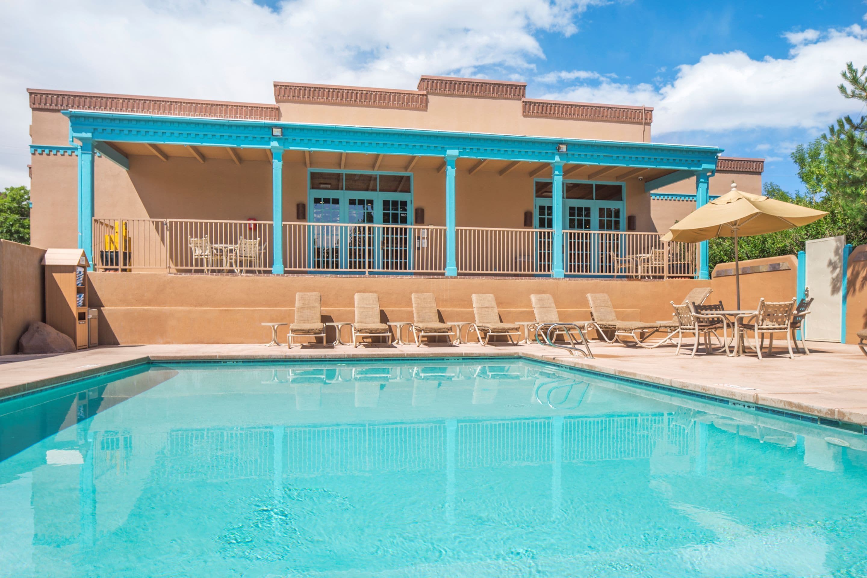 outdoor pool, pool umbrellas, pool loungers