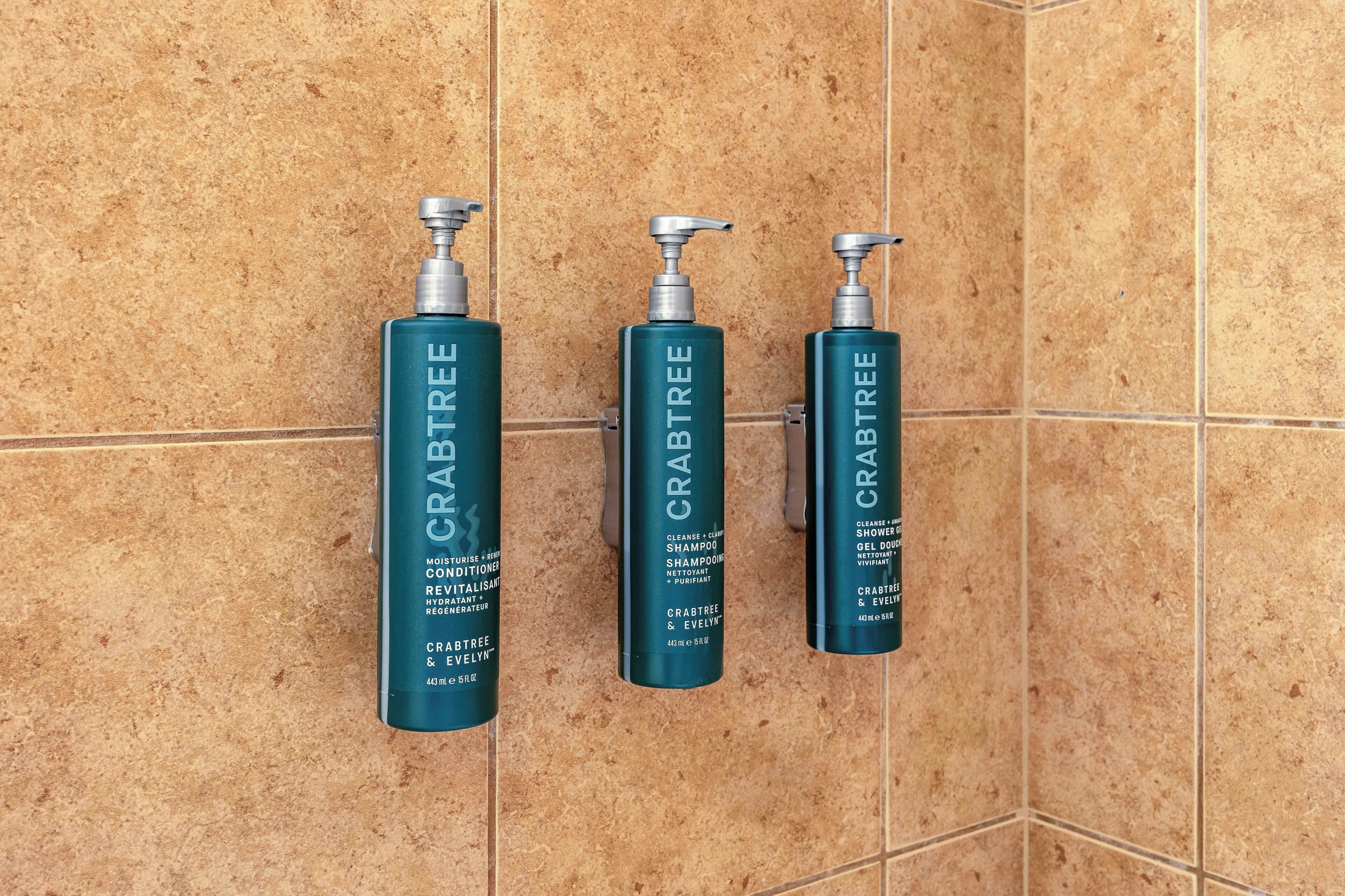 bathtub, free toiletries, hair dryer, towels