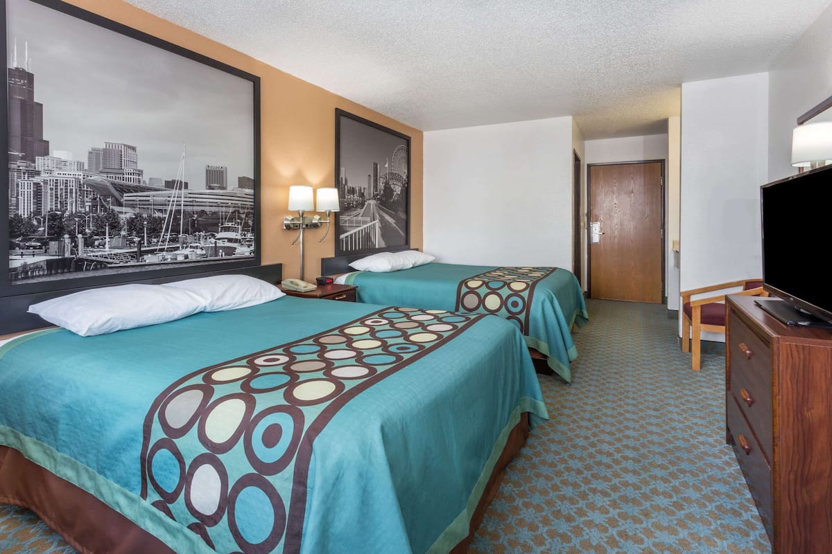 Room, 2 Queen Beds, Smoking | Blackout drapes, free cribs/infant beds, free WiFi, bed sheets