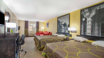 A hotel room with two beds, a desk, a chair, a TV, and a large window.