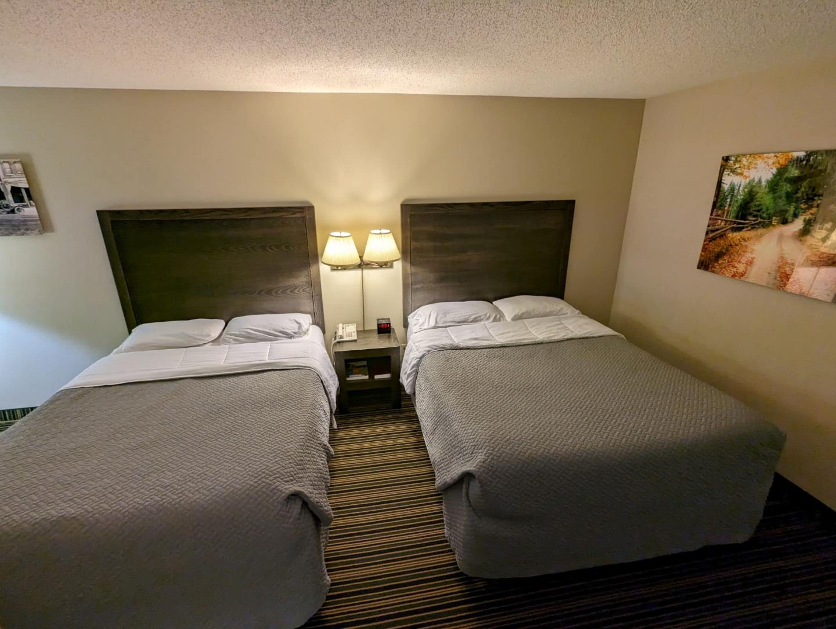 deluxe room, 2 queen beds | premium bedding, desk, laptop workspace, blackout curtains