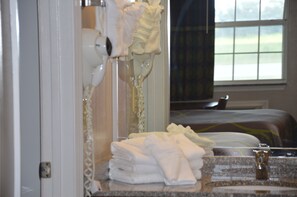 Room, 2 Queen Beds, Non Smoking | Bathroom amenities | Combined shower/tub, free toiletries, hair dryer, towels - Super 8 by Wyndham Madison (Madison)