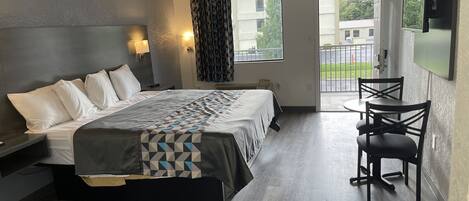 Standaard eenpersoonskamer, 1 kingsize bed, niet-roken | Een strijkplank/strijkijzer, gratis wifi, beddengoed