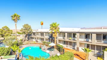 Outdoor pool, open 9:00 AM to 9:00 PM, pool loungers