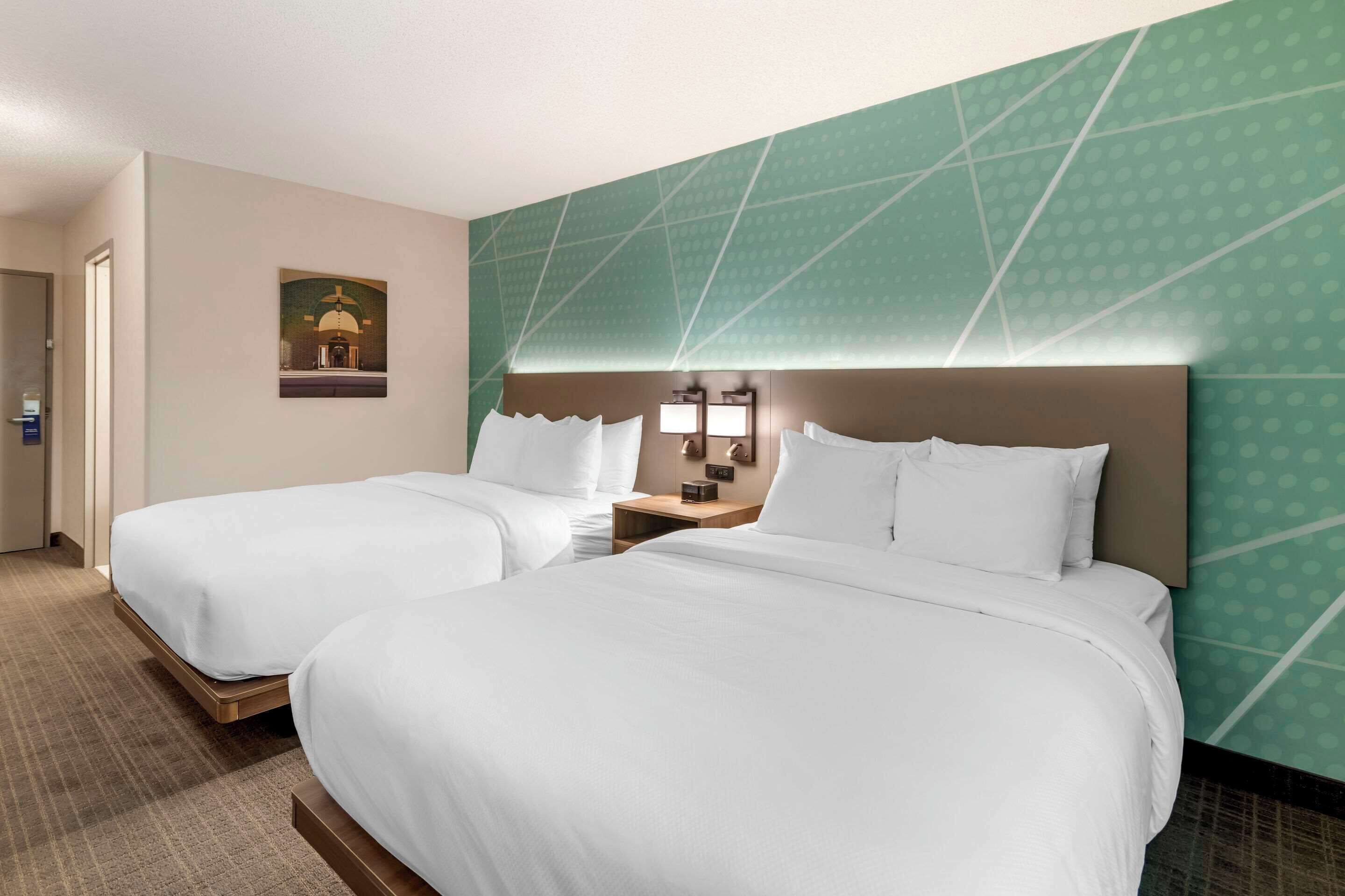 room, 2 queen beds, non smoking | premium bedding, in-room safe, desk, laptop workspace